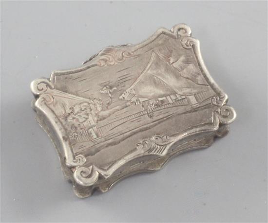 A Victorian silver vinaigrette by Nathaniel Mills, engraved with a view of Clifton Suspension Bridge, Birmingham 1846, 31mm.